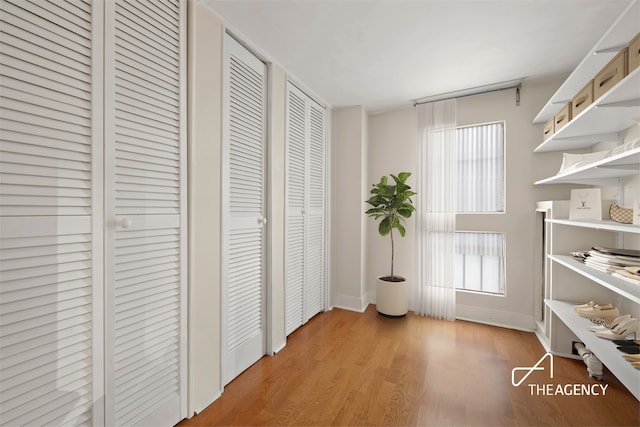 138 E 36th St Unit 1B, New York City, NY 10016 - corridor featuring light wood-style flooring and baseboards