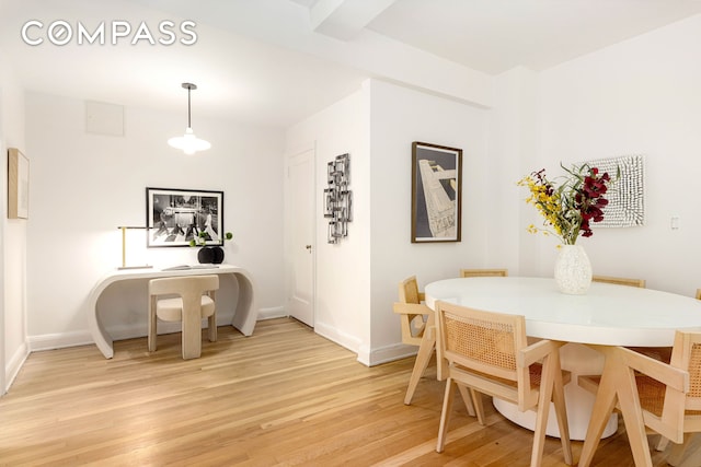 400 E 52nd St Unit 10K, New York City, NY 10022 - dining area with light wood finished floors and baseboards