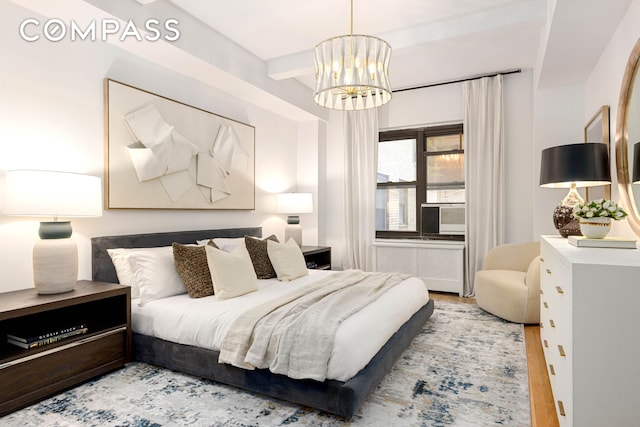 400 E 52nd St Unit 10K, New York City, NY 10022 - bedroom featuring a chandelier, beam ceiling, light wood-type flooring, and cooling unit