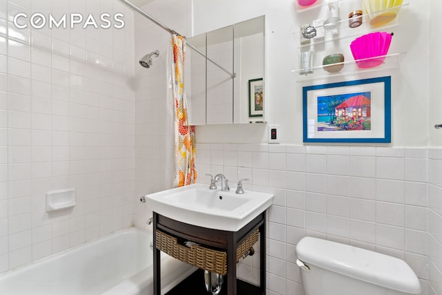 514 W 50th St Unit 5Rw, New York City, NY 10019 - full bathroom with shower / bath combo with shower curtain, vanity, and tile walls