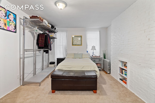 514 W 50th St Unit 5Rw, New York City, NY 10019 - carpeted bedroom featuring radiator