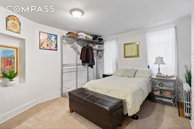 514 W 50th St Unit 5Rw, New York City, NY 10019 - carpeted bedroom with a closet