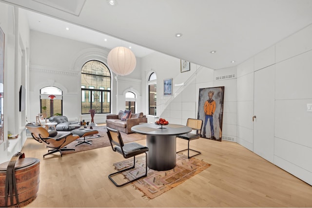 242 E 7th St Ph, Ph, New York City, NY 10009 - dining space with a towering ceiling, wood finished floors, and recessed lighting