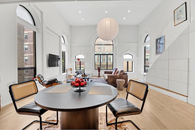 242 E 7th St Ph, Ph, New York City, NY 10009 - dining space with a high ceiling, light wood-type flooring, and recessed lighting