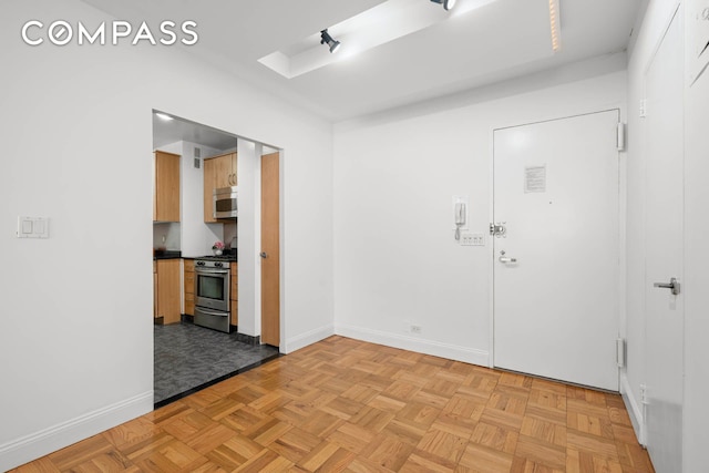 333 E 69th St Unit 3A, New York City, NY 10021 - unfurnished room featuring baseboards