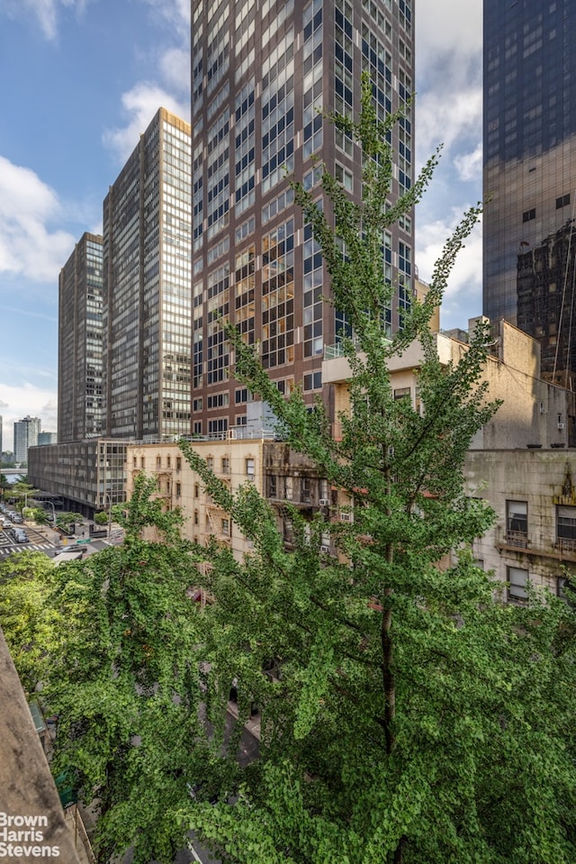 349 E 49th St Unit 6P, New York City, NY 10017 - view of building exterior with a city view