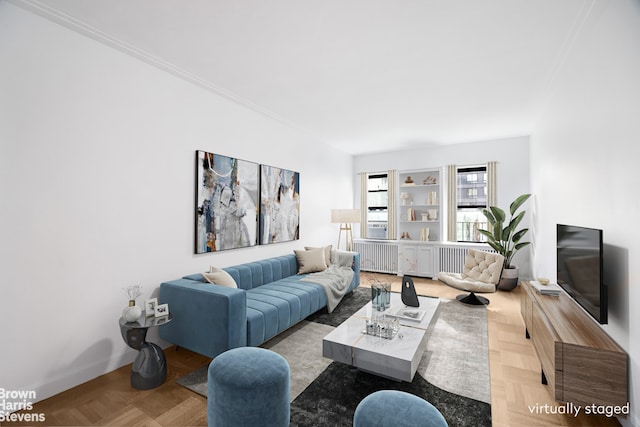 349 E 49th St Unit 6P, New York City, NY 10017 - living room featuring radiator and ornamental molding