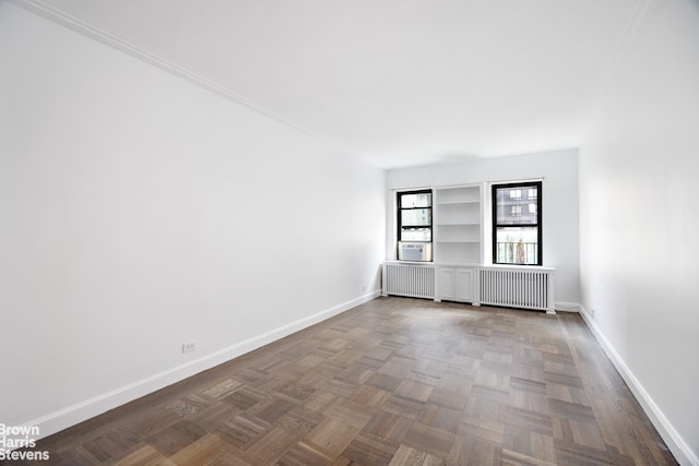 349 E 49th St Unit 6P, New York City, NY 10017 - spare room featuring radiator and radiator heating unit