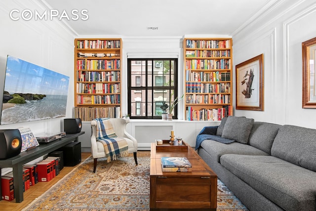 205 Hicks St Unit 2B, New York City, NY 11201 - living area featuring built in shelves and crown molding