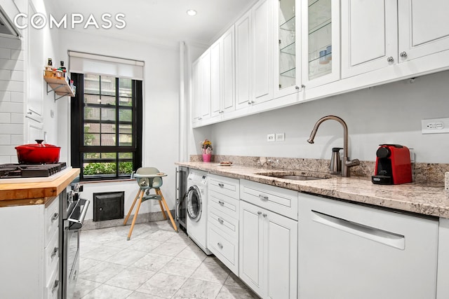 205 Hicks St Unit 2B, New York City, NY 11201 - washroom featuring washer / dryer and recessed lighting