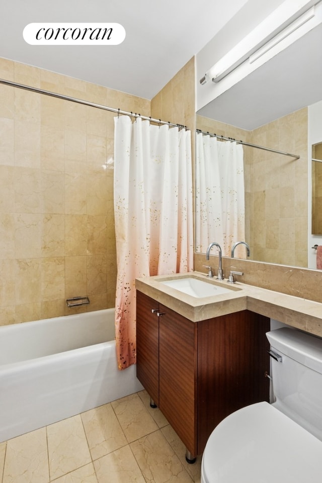 30 Little W St Unit 24A, New York City, NY 10004 - bathroom with shower / bathtub combination with curtain, vanity, and marble finish flooring