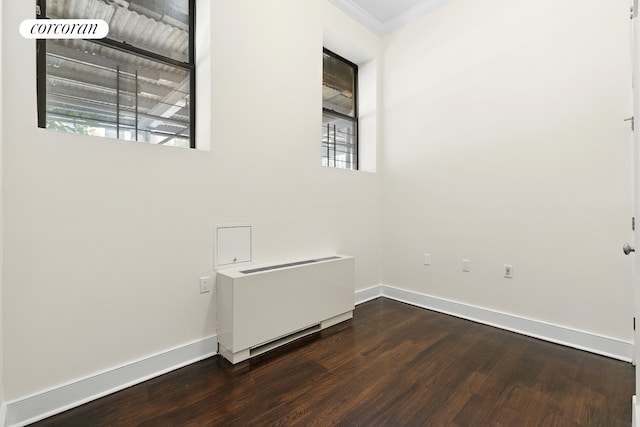 555 Lenox Ave Unit 1A, New York City, NY 10037 - empty room featuring crown molding, wood finished floors, plenty of natural light, and radiator