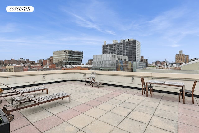 555 Lenox Ave Unit 1A, New York City, NY 10037 - view of patio / terrace featuring a view of skyline