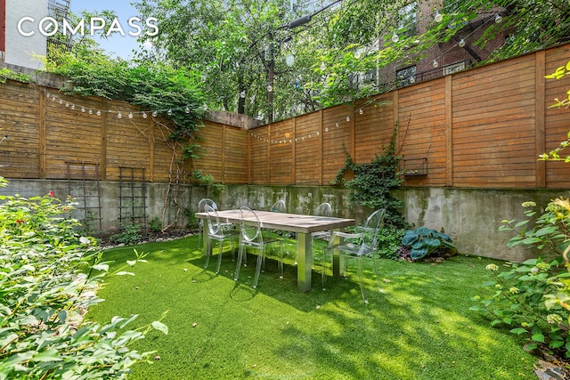 120 Pulaski St Unit 1B, New York City, NY 11206 - view of yard featuring outdoor dining space