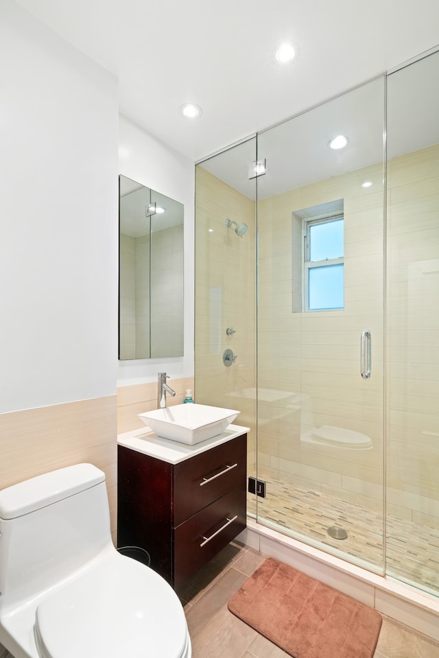 229 E 79th St Unit 7-B, New York City, NY 10075 - full bathroom featuring vanity, a stall shower, and recessed lighting