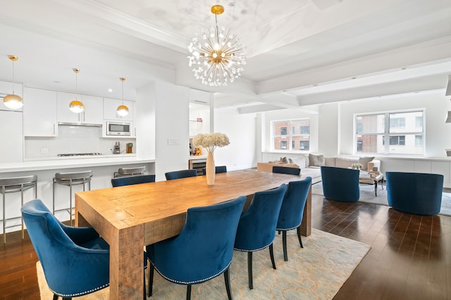 229 E 79th St Unit 7-B, New York City, NY 10075 - dining space with dark wood-style floors, a chandelier, beam ceiling, and crown molding