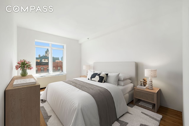 304 W 115th St Unit 6A, New York City, NY 10026 - bedroom featuring wood finished floors