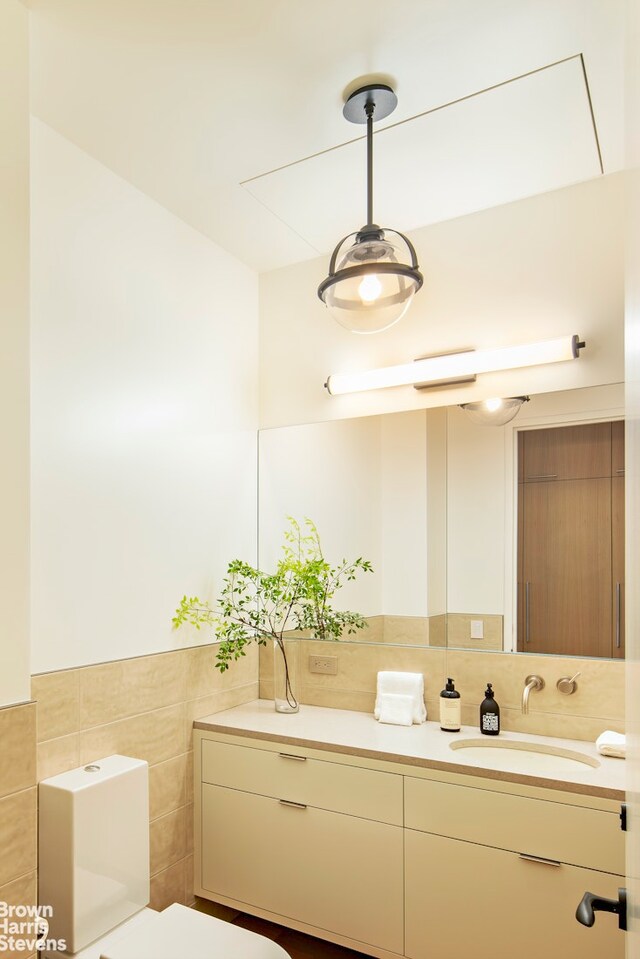 6 W 95th St, New York City, NY 10025 - bathroom with tile walls and vanity