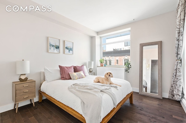 88 Morningside Ave Unit 8E, New York City, NY 10027 - bedroom with dark wood-style flooring and baseboards