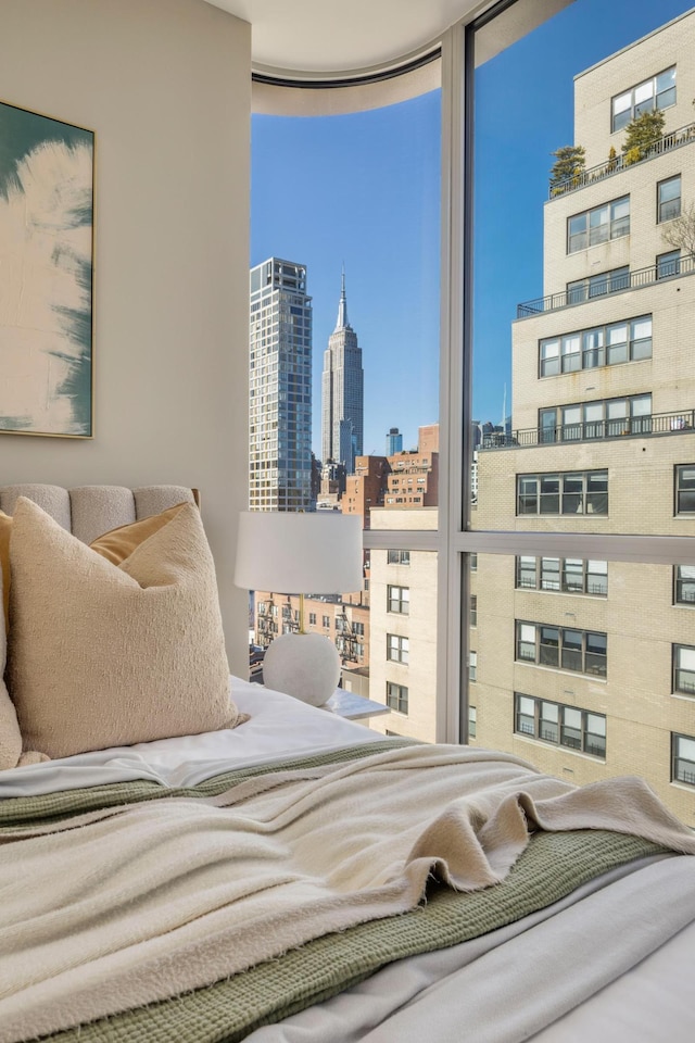 250 E 25th St Ph-A, Ph-A New York City, NY 10010 - bedroom with expansive windows and a skyline view