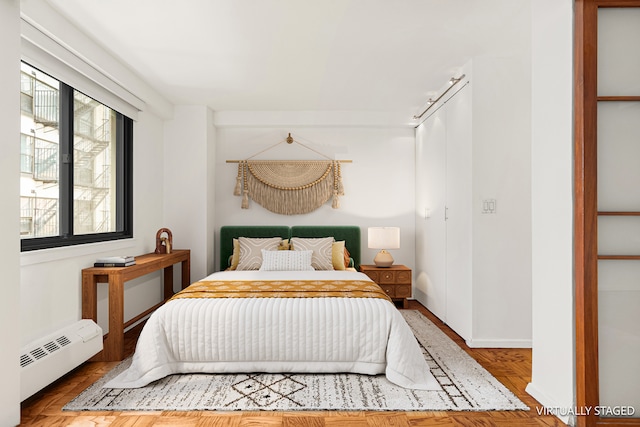 16 W 16th St Unit 7Rn, New York City, NY 10011 - bedroom with a baseboard radiator