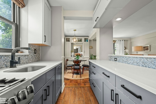 3103 Fairfield Ave Unit 4A, New York City, NY 10463 - kitchen featuring decorative backsplash, light countertops, plenty of natural light, range, and recessed lighting