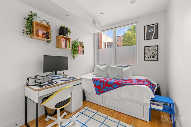 725 Lafayette Ave Unit 1A, New York City, NY 11221 - bedroom featuring light wood-type flooring, a desk, and recessed lighting