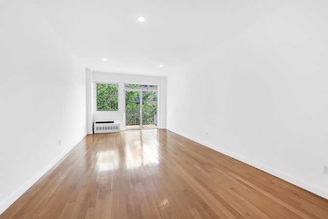 870 Pacific St Unit 3-F, New York City, NY 11238 - spare room with light wood-type flooring and recessed lighting
