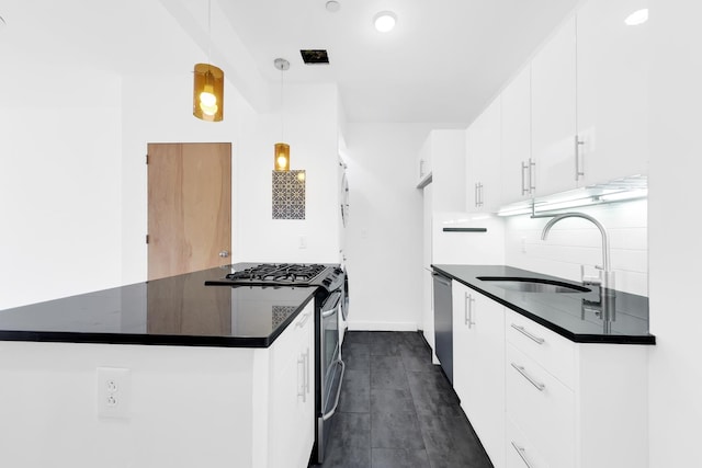 870 Pacific St Unit 3-F, New York City, NY 11238 - kitchen featuring stainless steel appliances, dark countertops, white cabinetry, and decorative backsplash