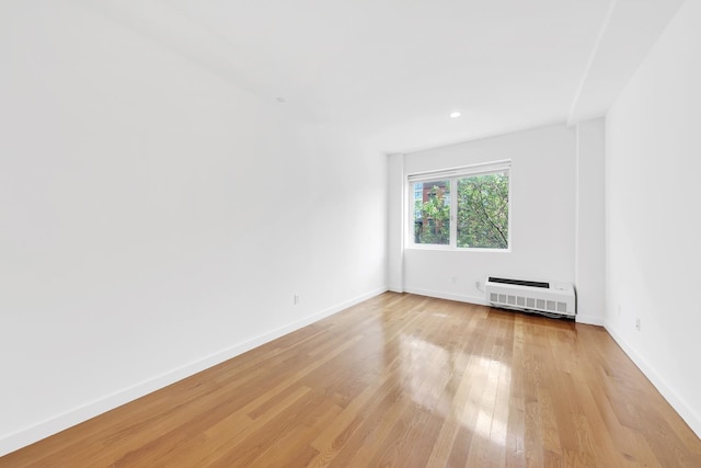 870 Pacific St Unit 3-F, New York City, NY 11238 - empty room featuring radiator and light wood finished floors