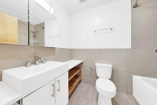 870 Pacific St Unit 3-F, New York City, NY 11238 - full bath featuring tile walls, vanity, a tub to relax in, a shower, and tile patterned floors