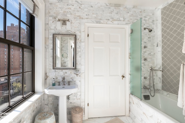 1220 Park Ave Unit 9A, New York City, NY 10128 - bathroom featuring tiled shower / bath and tile walls