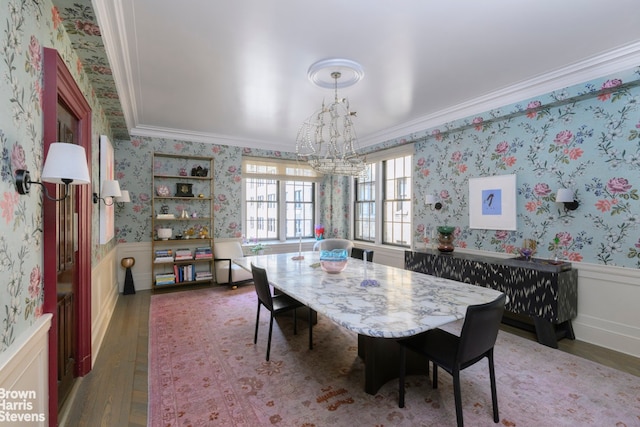 1220 Park Ave Unit 9A, New York City, NY 10128 - dining area with crown molding, a chandelier, wallpapered walls, wood finished floors, and a wainscoted wall