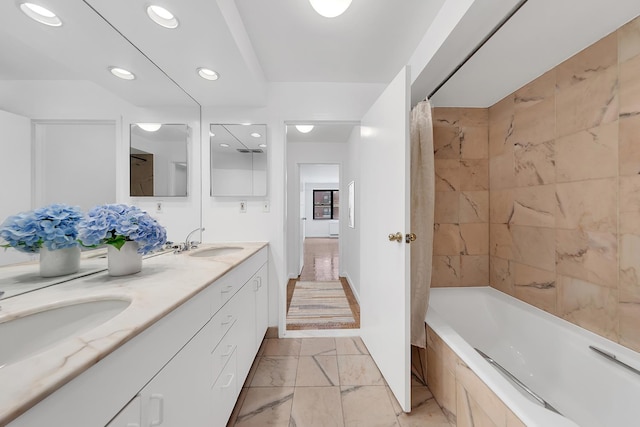 111 E 85th St Unit 3-A, New York City, NY 10028 - full bath with double vanity, marble finish flooring, tiled shower / bath, and recessed lighting