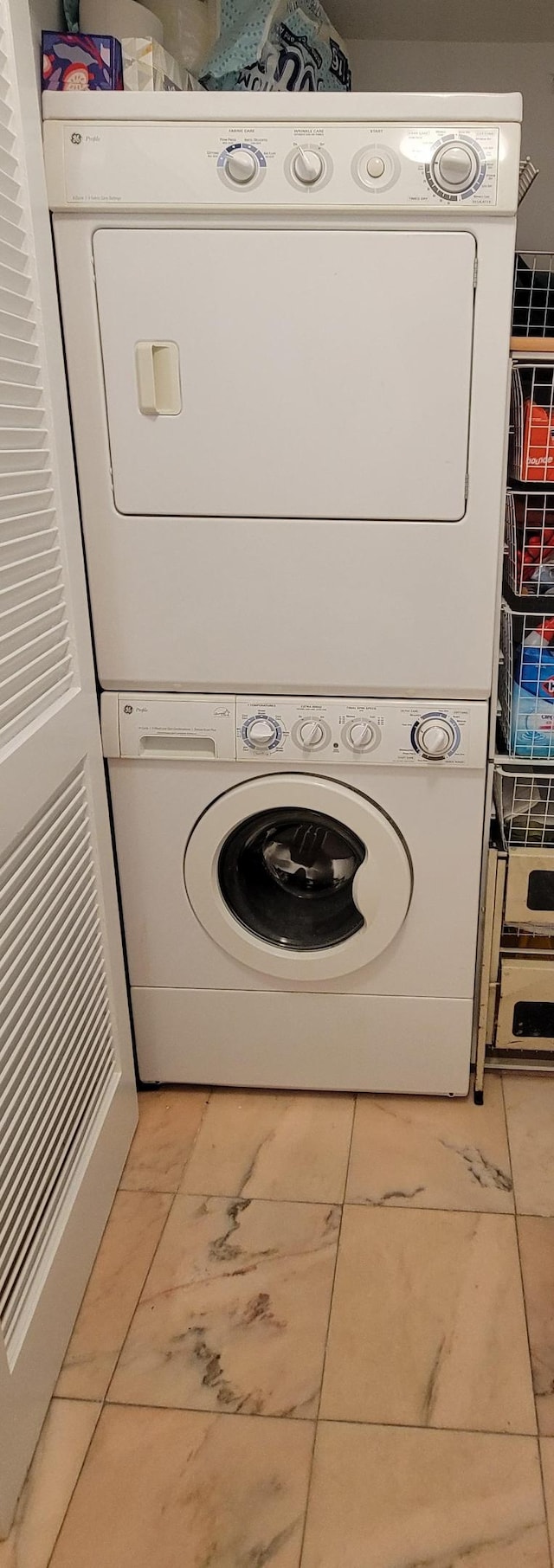 111 E 85th St Unit 3-A, New York City, NY 10028 - washroom with stacked washer / drying machine