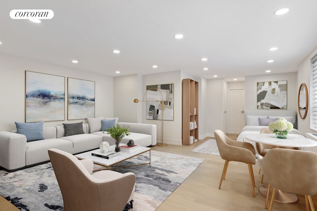 200 E 24th St Unit 301, New York City, NY 10010 - living area featuring light wood-type flooring and recessed lighting