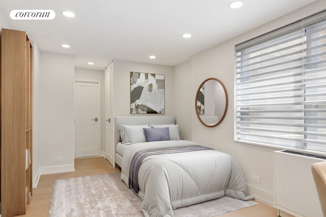 200 E 24th St Unit 301, New York City, NY 10010 - bedroom featuring light wood-style floors and recessed lighting
