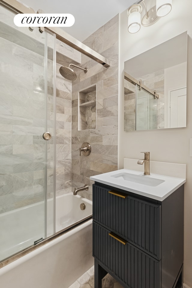 200 E 24th St Unit 301, New York City, NY 10010 - bathroom featuring combined bath / shower with glass door and vanity