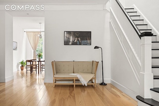 125 Rutland Rd, New York City, NY 11225 - sitting room featuring stairway and wood-type flooring