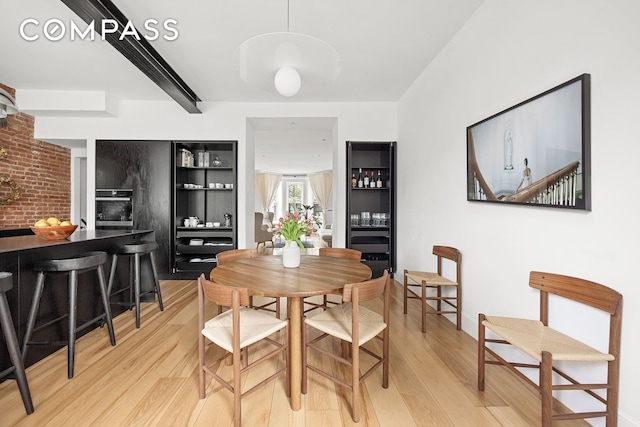 125 Rutland Rd, New York City, NY 11225 - dining area with light wood-style floors