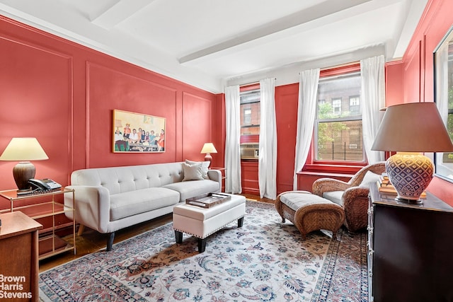 59 W 71st St Unit 4A, New York City, NY 10023 - living room featuring a decorative wall, wood finished floors, and beamed ceiling