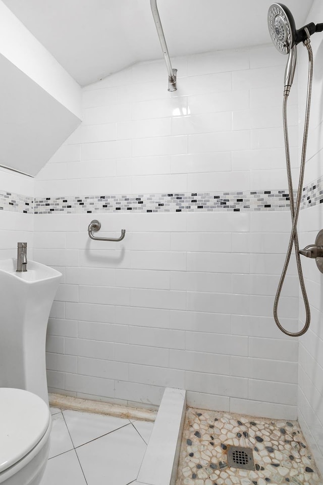100-15 Ascan Ave, New York City, NY 11375 - bathroom with a tile shower and tile patterned floors