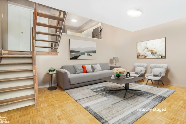 225 E 86th St Unit 801, New York City, NY 10028 - living area featuring stairway and baseboards