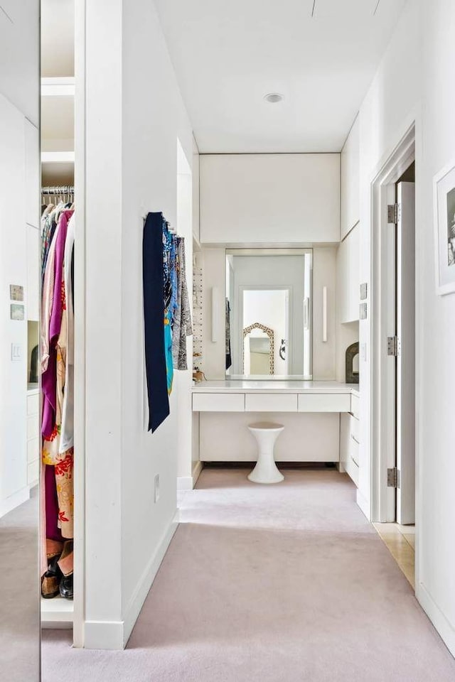 525 W 22nd St Unit 3Af, New York City, NY 10011 - bathroom featuring baseboards and a spacious closet