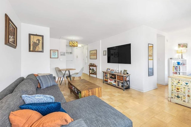 245 E 24th St Unit 14A, New York City, NY 10010 - living room with baseboards