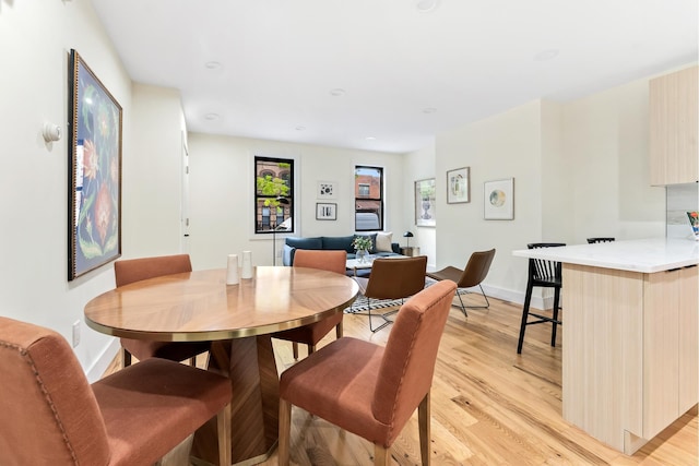 449 Pulaski St, New York City, NY 11221 - dining space with light wood-type flooring