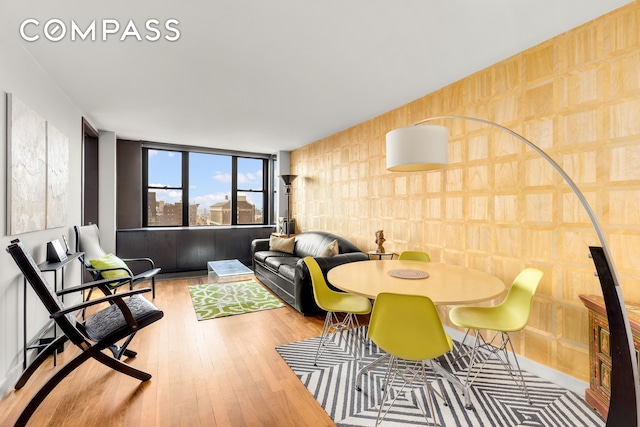 201 E 17th St Unit 31E, New York City, NY 10003 - dining space with wood finished floors