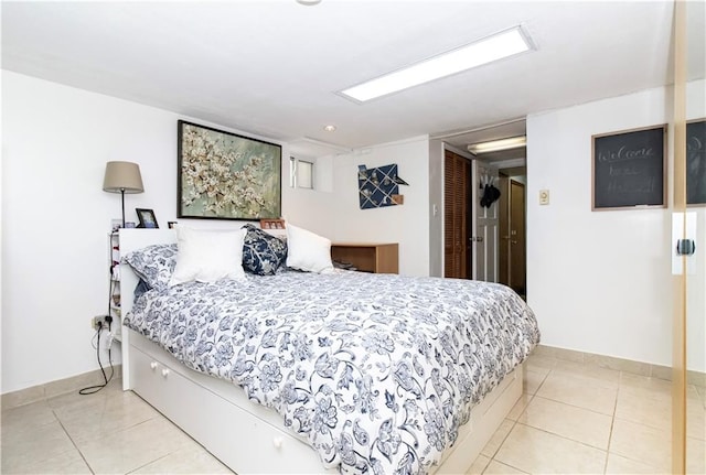 7007 Narrows Ave, New York City, NY 11209 - bedroom featuring tile patterned floors and baseboards