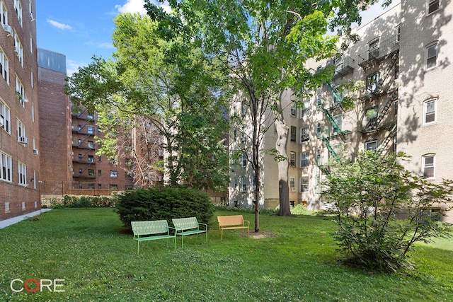 35-21 79th St Unit 6A, New York City, NY 11372 - surrounding community with a lawn