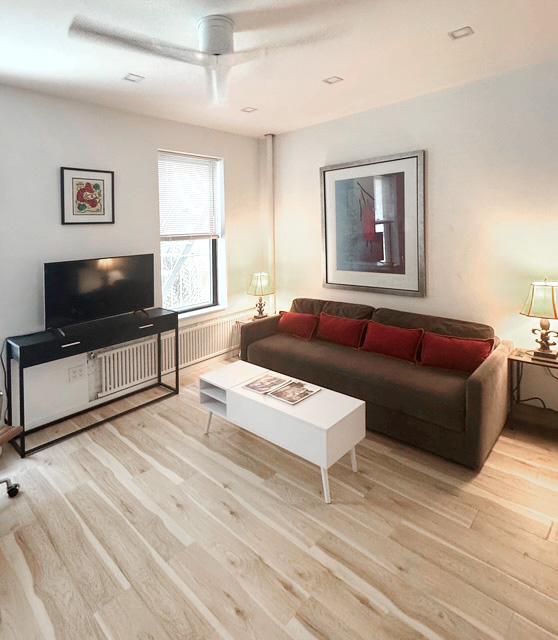 32 Jones St Unit 2D, New York City, NY 10014 - living area with wood finished floors
